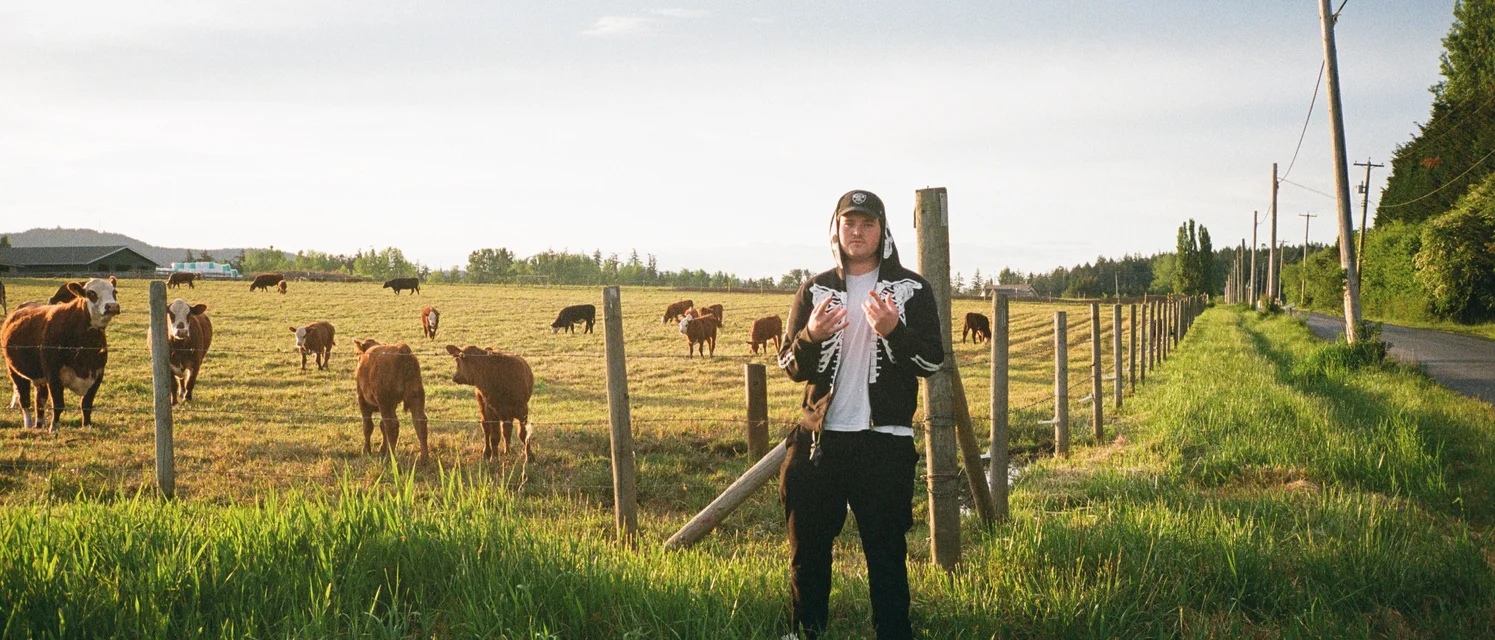 Cult Member in a field — Spotify artist header
