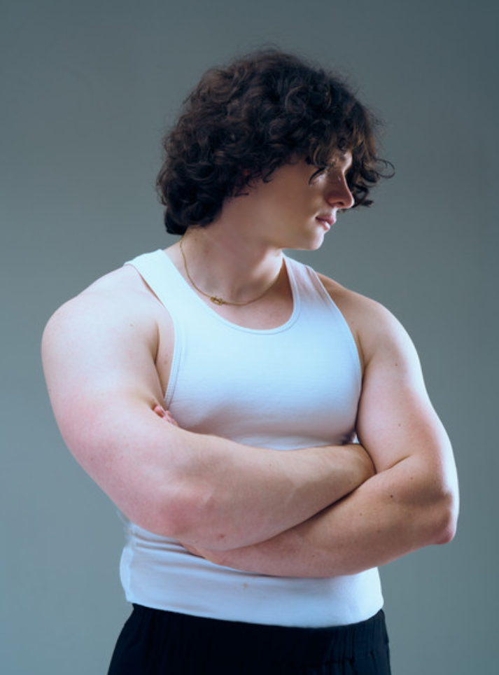 MARXO in a white tank top